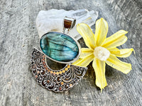 Ancestral Wisdom: Sterling Silver Pendant with Majestic Gemstone and Filigree Tapestry