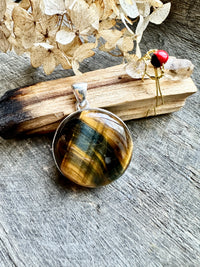 925 Silver Circle Tiger's Eye Pendant: Timeless Charm with Earthy Energies